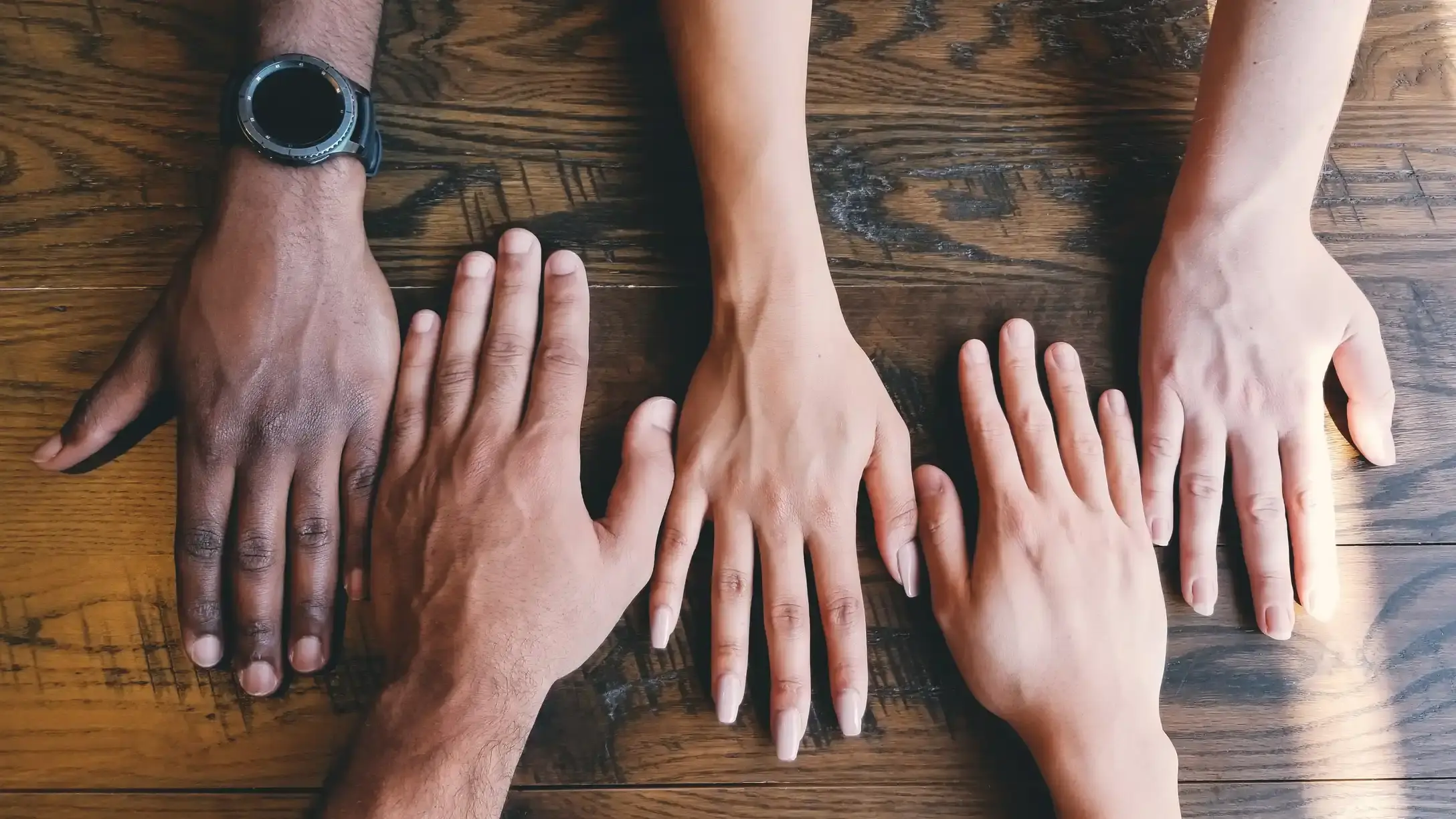 Hands on a table