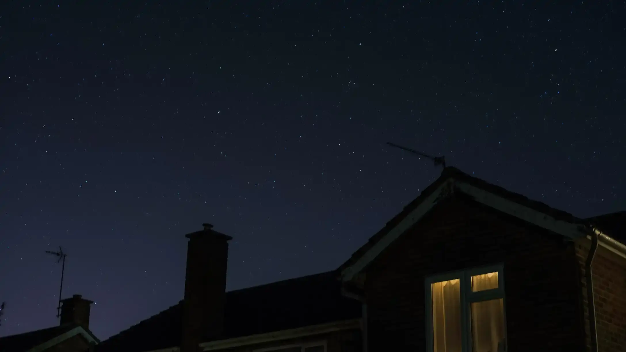 The roof of a house at night