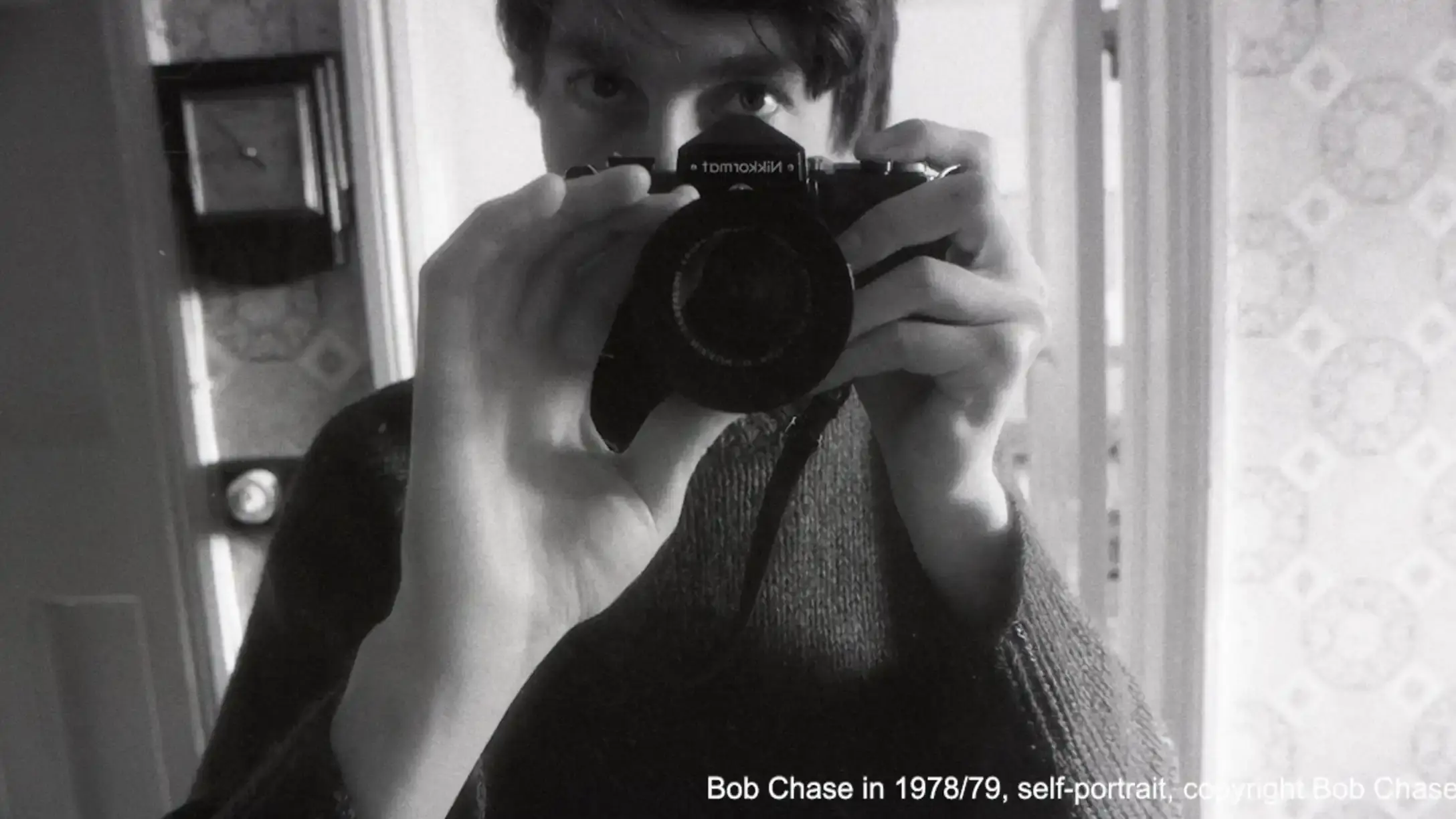 Photographer Bob Chase with camera