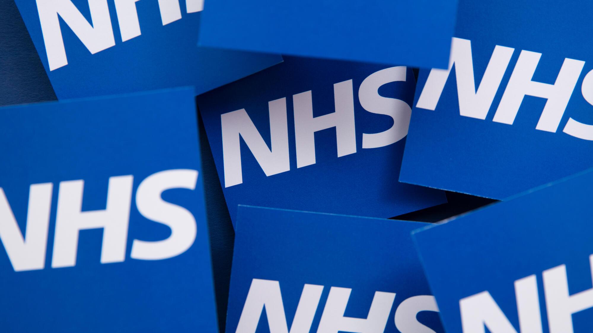 NHS logo repeated in squares
