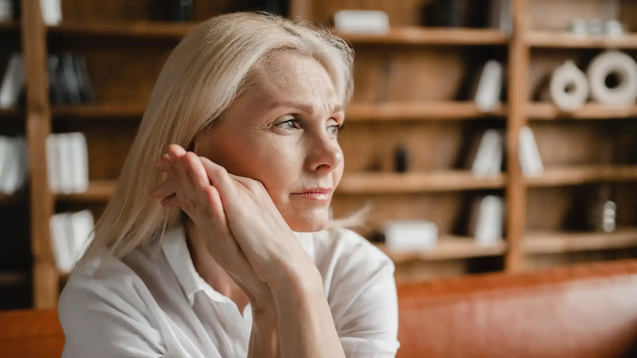 Woman on sofa looking to the right