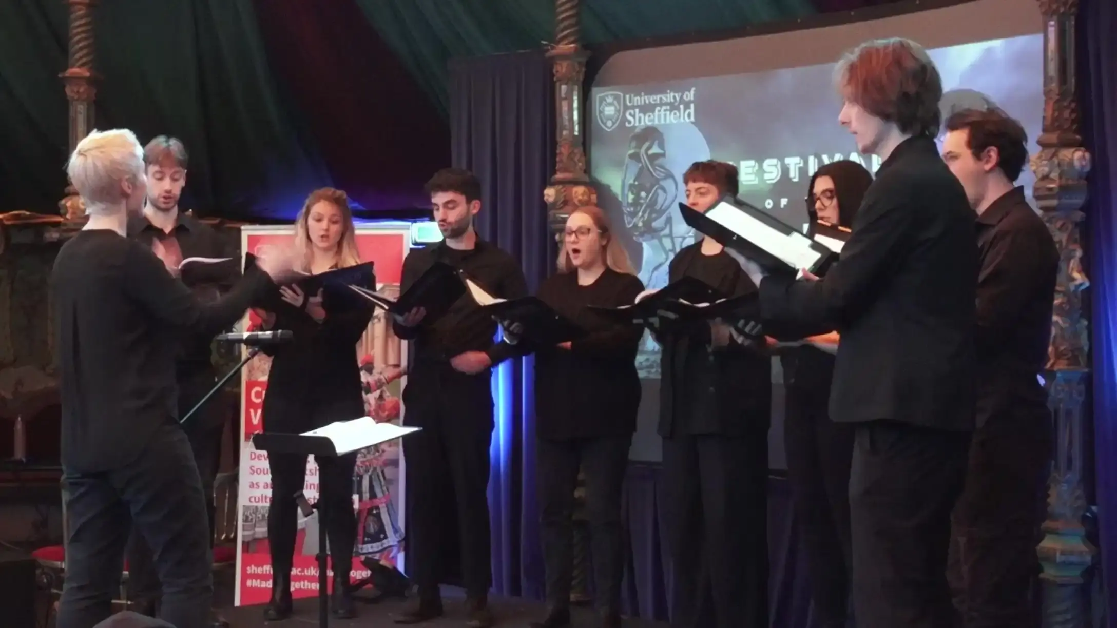 Photo of a choral choir dressed in black