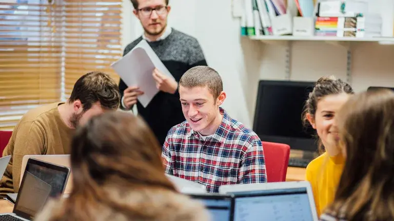 A class of students working