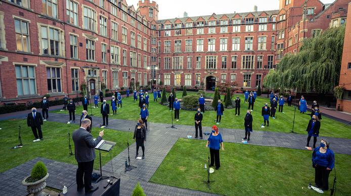 Chorus UK choir performing in the Firth Court quad
