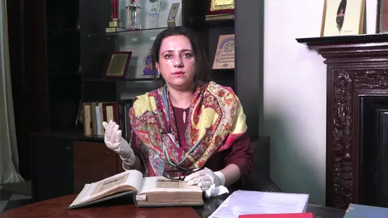 a picture of an indian women with a book