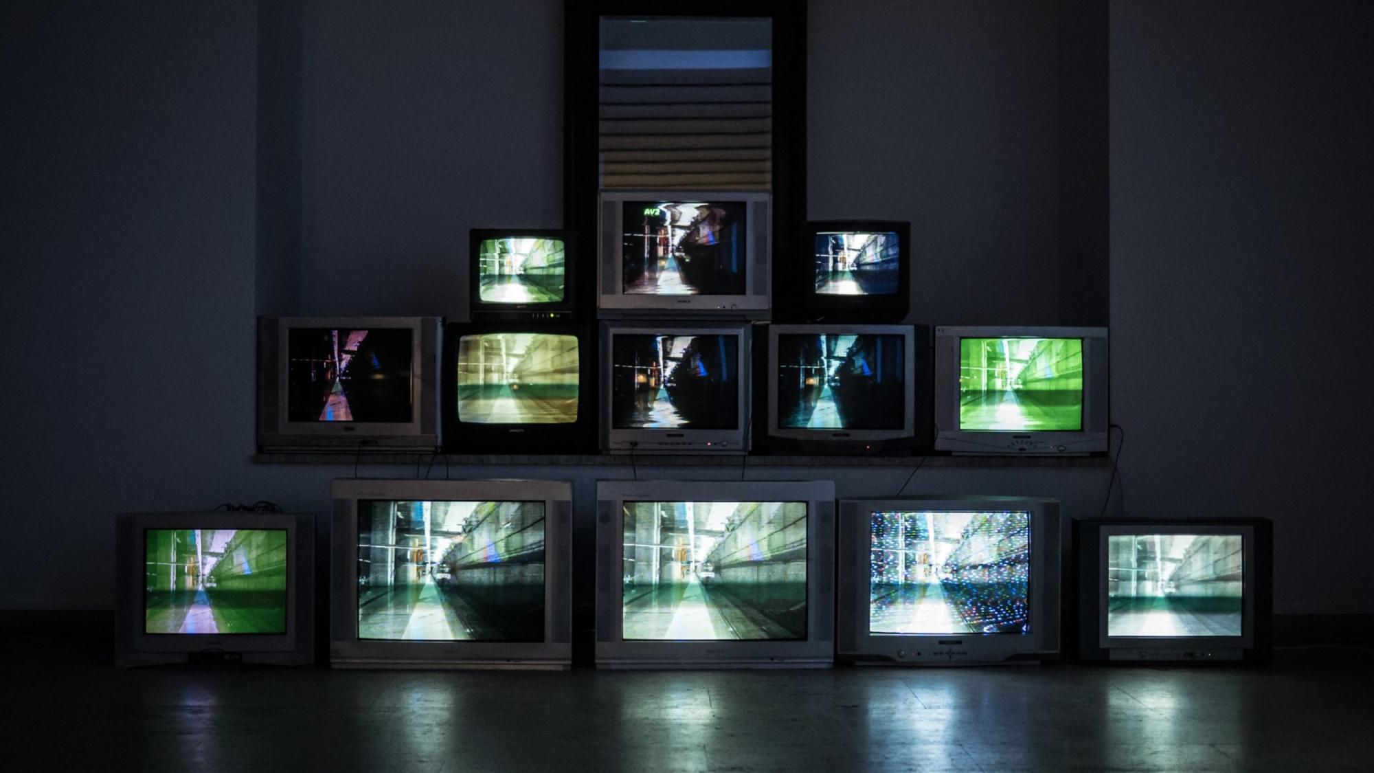 Television screens in a dark room