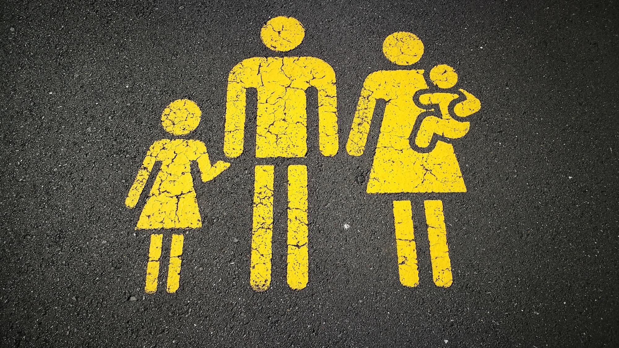Logo illustration of a family with young children