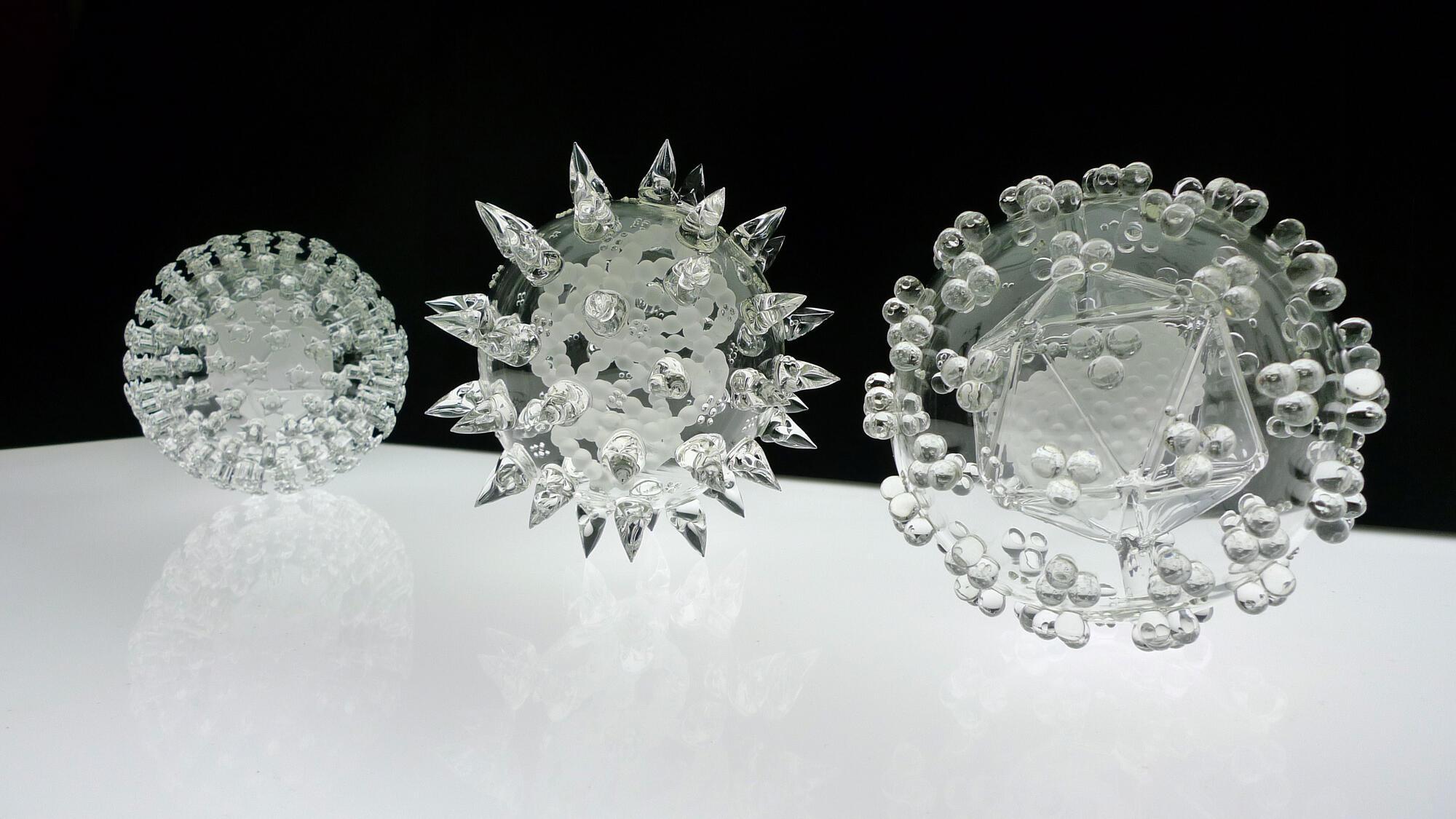 a collection of glass sculptures 