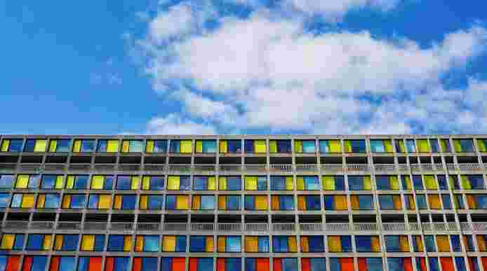 Park Hill flats building against a blue sky