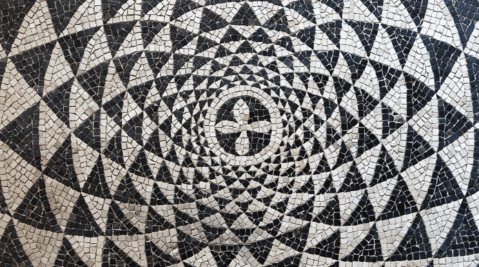 A black and white mosaic tiled floor