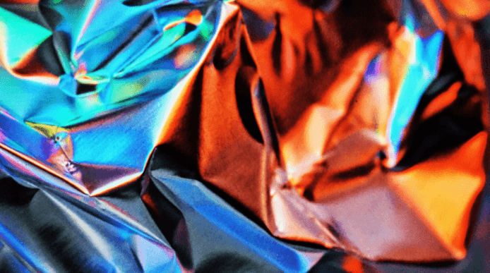 Close-up image of crinkled foil reflecting light 