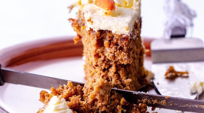 A slice of carrot cake on a plate