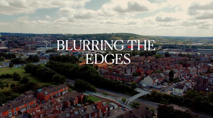 Title Screen with text 'blurring the edges' and a panoramic shot of Rotherham